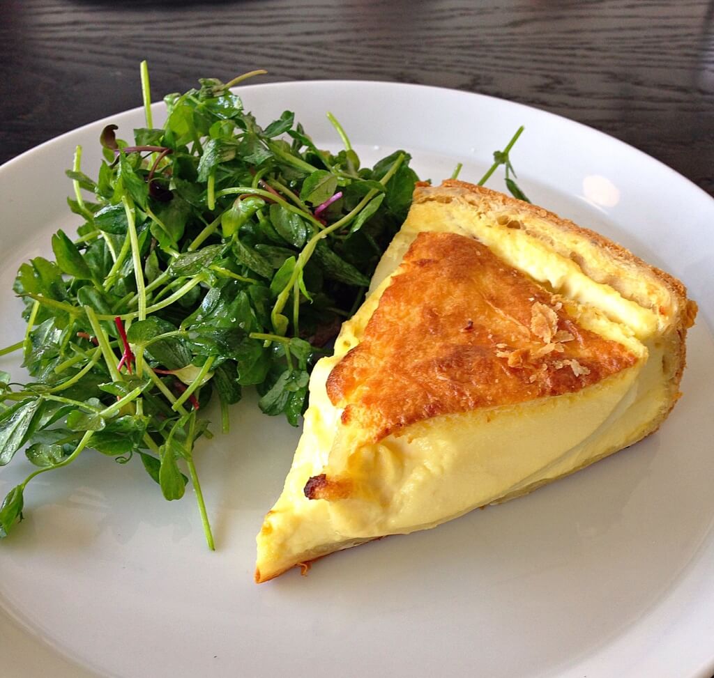 Onion Quiche at Cellar Door Provisions // Photo: @sherriesavorsthecity