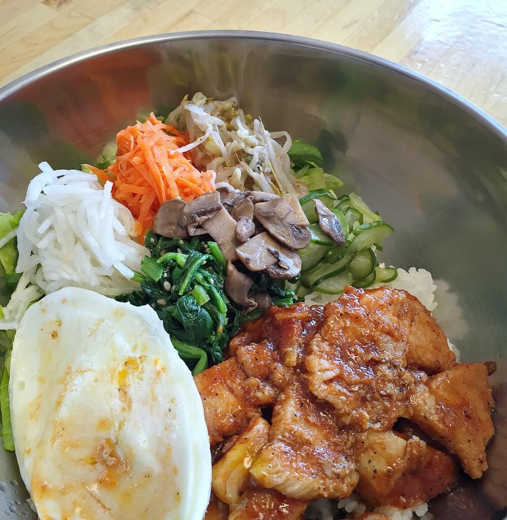 Spicy Chicken Rice Bowl at Dak // Photo: @sherriesavorsthecity