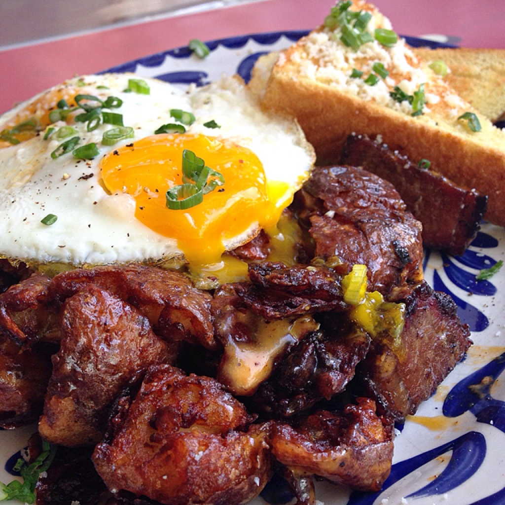 Smoked Brisket Hash at Dove's Luncheonette // Photo: @sherriesavorsthecity