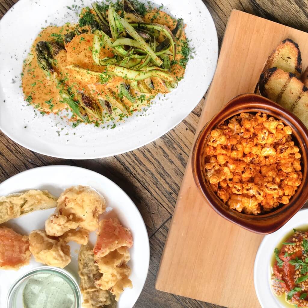 Grilled Asparagus, Fried Giardiniere, and Gochugarou Chili Popcorn at Forbidden Root // Photo: @topchicagoeats