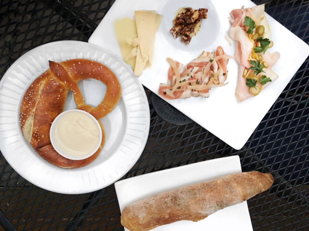 Pretzel with Cauliflower Fondue and Charcuterie Board at Table, Donkey, and Stick // Photo: @topchicagoeats