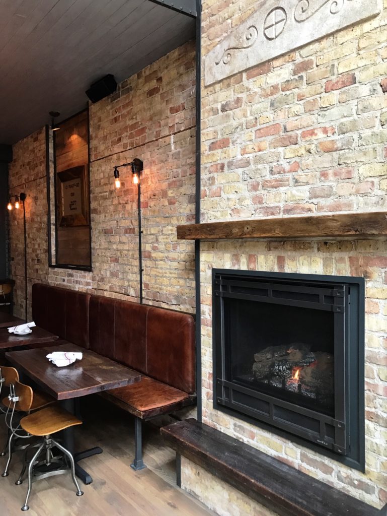 Fab Review: Centennial Crafted Beer and Eatery // Fireplace // Photo: @topchicagoeats