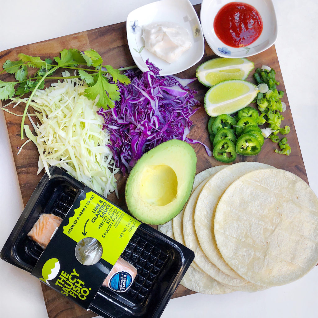 Fab Recipe: Easy Salmon Fish Tacos with Spicy Slaw // The Saucy Fish Co // Photo: @fabsoopark